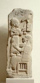 The funerary stela of the augur Tarhunpiya, with folded writing board and stylus (note the spatula at its bottom end), from Maras, 8th century BC. The funerary stela of the augur Tarhunpiya, with folded writing board and stylus (note the spatula at its bottom end), from Maras, 8th century BC.